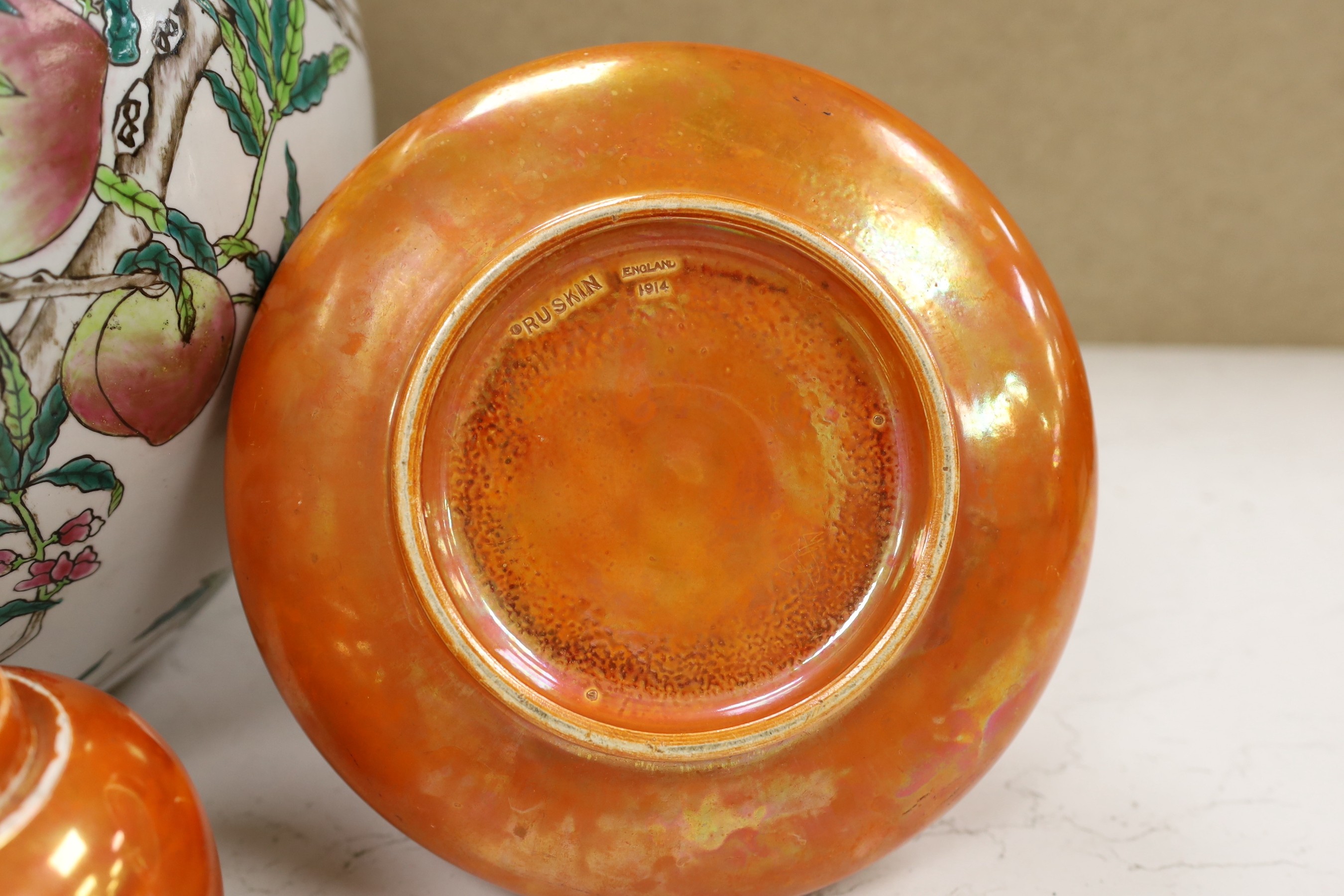 A Ruskin orange lustre vase, dated 1914 and a similar ginger jar, dated 1920, tallest 19cm